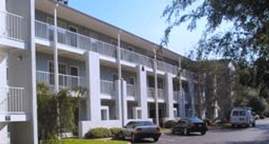 Apartment building and parking