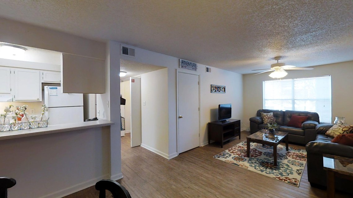 Furnished living room and kitchen in a Whitehall apartment